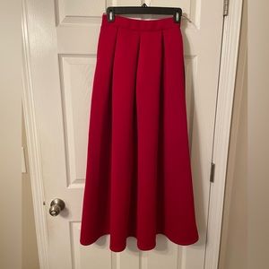 Two-toned, red & black scuba skirt, with pockets.
